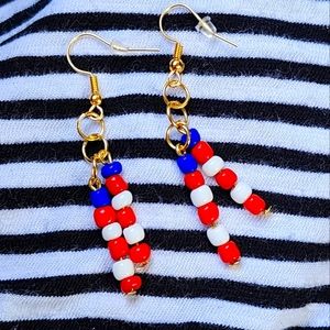 Blue red and white earringd